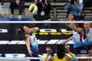 Omaha Supernovas Natalia Valentin-Anderson (1) quickly taps the ball over the net against San Diego Mojo Rainelle Jones (1) in the second set during a professional volleyball match Sunday, February 16, 2025 in Omaha, Nebraska. Photo by John S. Peterson.