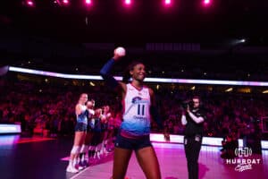 Omaha Supernovas Kelsie Payne (11) throws out a mini-volleyball to a fan before taking on the San Diego Mojo during a professional volleyball match Sunday, February 16, 2025 in Omaha, Nebraska. Photo by John S. Peterson.