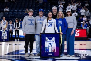 Creighton Bluejay guard Molly Mogensen (21) poses with fer family on Senior Day after the win against the Georgetown Hoyas during a college basketball game Saturday, February 15, 2025 in Omaha, Nebraska. Photo by John S. Peterson.