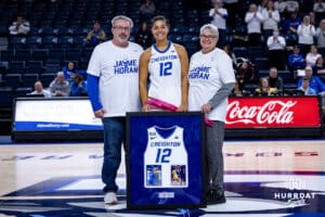 Creighton Bluejay guard Jayme Horan (12) poses with her family on Senior Day after the win against the Georgetown Hoyas during a college basketball game Saturday, February 15, 2025 in Omaha, Nebraska. Photo by John S. Peterson.