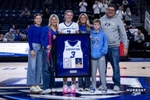 Creighton Bluejay guard Sydney Golladay (3) poses with her family for Senior Day after the win against the Georgetown Hoyas during a college basketball game Saturday, February 15, 2025 in Omaha, Nebraska. Photo by John S. Peterson.