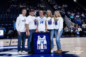 Creighton Bluejay senior Mallory Brake (14) poses with her family for Senior Day after the game against Georgetown Hoyas during a college basketball game Saturday, February 15, 2025 in Omaha, Nebraska. Photo by John S. Peterson.