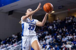 Creighton Bluejay guard Brooke Littrell (33) makes a lay up in the fourth quarter against the Georgetown Hoyas during a college basketball game Saturday, February 15, 2025 in Omaha, Nebraska. Photo by John S. Peterson.