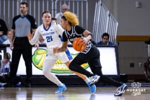 Creighton Bluejay guard Molly Mogensen (21) guards Georgetown Hoya guard Khadee Hession (8) in the second quarter during a college basketball game Saturday, February 15, 2025 in Omaha, Nebraska. Photo by John S. Peterson.