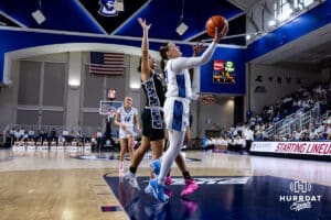 Creighton Bluejay guard Molly Mogensen (21) makes a lay up against the Georgetown Hoyas in the first quarter during a college basketball game Saturday, February 15, 2025 in Omaha, Nebraska. Photo by John S. Peterson.