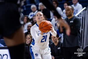 Creighton Bluejay guard Molly Mogensen (21) lines up her three-point shot against the Georgetown Hoyas in the first quarter during a college basketball game Saturday, February 15, 2025 in Omaha, Nebraska. Photo by John S. Peterson.