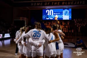 Creighton Bluejays huddle up before taking on the Georgetown Hoyas during a college basketball game Saturday, February 15, 2025 in Omaha, Nebraska. Photo by John S. Peterson.