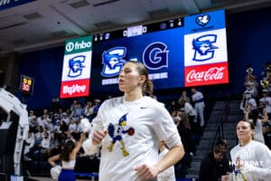 reighton Bluejay guard Morgan Maly (30) runs out to take on the Georgetown Hoyas during a college basketball game Saturday, February 15, 2025 in Omaha, Nebraska. Photo by John S. Peterson.