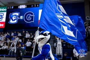 Creighton Bluejays mascot Billy leads the Bluejays out with the flag to take on the Georgetown Hoyas during a college basketball game Saturday, February 15, 2025 in Omaha, Nebraska. Photo by John S. Peterson.