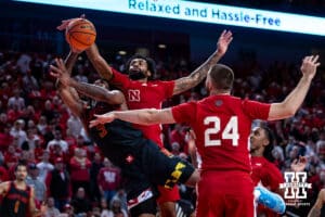 Nebraska Cornhusker guard Brice Williams (3) tries to block a shot from Maryland Terrapin guard Selton Miguel (9) in the second half during a college basketball game Thursday, February 13, 2025 in Lincoln, Nebraska. Photo by John S. Peterson.