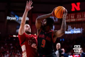 Nebraska Cornhusker guard Rollie Worster (24) guards against Maryland Terrapin guard Selton Miguel (9) in the first half during a college basketball game Thursday, February 13, 2025 in Lincoln, Nebraska. Photo by John S. Peterson.
