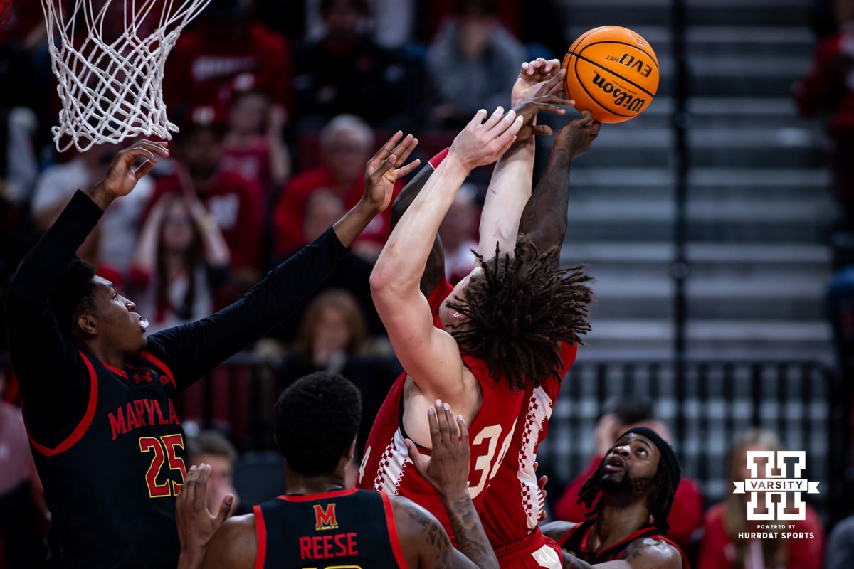 Nebraska Cornhusker center Braxton Meah (34) and forward Juwan Gary (4) reach for a rebound against Maryland Terrapin center Derik Queen (25) in the first half during a college basketball game Thursday, February 13, 2025 in Lincoln, Nebraska. Photo by John S. Peterson.