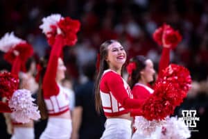 Nebraska Cornhuskers cheerleader performing at a break in the action against the Maryland Terrapins during a college basketball game Thursday, February 13, 2025 in Lincoln, Nebraska. Photo by John S. Peterson.