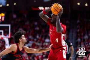 Nebraska Cornhusker forward Juwan Gary (4) makes a pass against Maryland Terrapin guard Ja'Kobi Gillespie (0) in the first half during a college basketball game Thursday, February 13, 2025 in Lincoln, Nebraska. Photo by John S. Peterson.