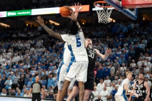 Creighton Bluejays Jamiya Neal blocks a shot during a college basketball game against UCONN on February 11th, 2025 in Omaha Nebraska. Photo by Brandon Tiedemann.
