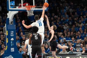 Creighton Bluejays Ryan Kalkbrenner blocks a shot during a college basketball game against UCONN on February 11th, 2025 in Omaha Nebraska. Photo by Brandon Tiedemann.