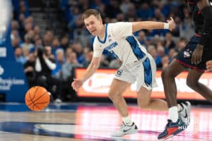Creighton Bluejays Steven Ashworth chases after the ball during a college basketball game against UCONN on February 11th, 2025 in Omaha Nebraska. Photo by Brandon Tiedemann.