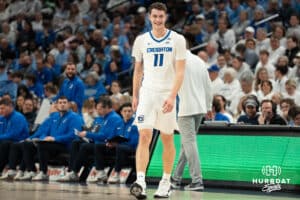 Creighton Bluejays Ryan Kalkbrenner smiles after a timeout during a college basketball game against UCONN on February 11th, 2025 in Omaha Nebraska. Photo by Brandon Tiedemann.