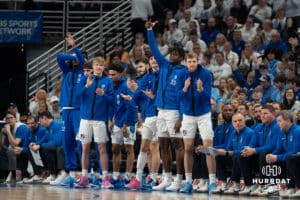 Creighton Bluejays celebrate during a college basketball game against UCONN on February 11th, 2025 in Omaha Nebraska. Photo by Brandon Tiedemann.