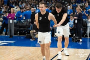 Creighton Bluejays Steven Ashworth and Ryan Kalkbrenner highfive before a college basketball game against UCONN on February 11th, 2025 in Omaha Nebraska. Photo by Brandon Tiedemann.