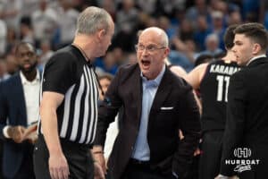 UConn Huskies head coach Dan Hurley argues with a ref during a college basketball game against Creighton on February 11th, 2025 in Omaha Nebraska. Photo by Brandon Tiedemann.