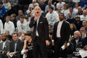 UConn Huskies head coach Dan Hurley calling out a play during a college basketball game against Creighton on February 11th, 2025 in Omaha Nebraska. Photo by Brandon Tiedemann.