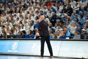 UConn Huskies head coach Dan Hurley screams during a college basketball game against Creighton on February 11th, 2025 in Omaha Nebraska. Photo by Brandon Tiedemann.