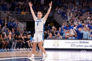 Creighton Bluejays Steven Ashworth celebrates a three-point shot made by Ryan Kalkbrenners against Marquette during a college basketball game on Saturday, February 8, 2025, in Omaha, Nebraska. Photo by Brandon Tiedemann.