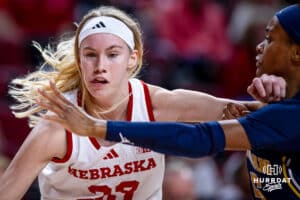Nebraska Cornhuskers guard Britt Prince (23) uses her forearm to keep Michigan Wolverines guard Brooke Daniels (5) away in the second quarter during a college women’s basketball game on Wednesday, February 6, 2025 in Lincoln, Nebraska. Photo by John S. Peterson.