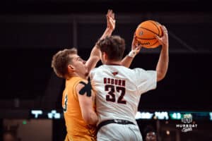 Omaha Maverick Tony Osburn faces off against defender against the North Dakota State Bison during a college basketball game on Saturday, February 8, 2025 in Omaha, Nebraska. Photo by Logan Hock.