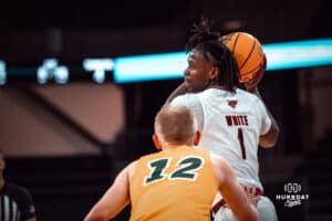 Omaha Maverick JJ White looks for an open man against the North Dakota State Bison during a college basketball game on Saturday, February 8, 2025 in Omaha, Nebraska. Photo by Logan Hock.