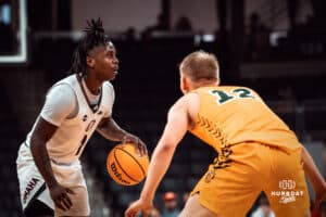Omaha Maverick JJ White looks for an open man against the North Dakota State Bison during a college basketball game on Saturday, February 8, 2025 in Omaha, Nebraska. Photo by Logan Hock.