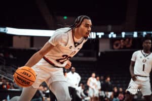 Omaha Maverick Kamryn Thomas dribbles toward the basket against the North Dakota State Bison during a college basketball game on Saturday, February 8, 2025 in Omaha, Nebraska. Photo by Logan Hock.