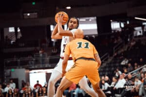 Omaha Maverick Kamryn Thomas faces off against defender against the North Dakota State Bison during a college basketball game on Saturday, February 8, 2025 in Omaha, Nebraska. Photo by Logan Hock.