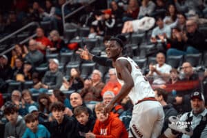 Omaha Maverick Ja'Sean Glover celebrates a three-pointer against the North Dakota State Bison during a college basketball game on Saturday, February 8, 2025 in Omaha, Nebraska. Photo by Logan Hock.