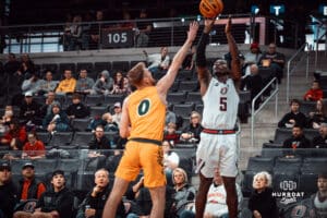 Omaha Maverick Ja'Sean Glover takes a shot against the North Dakota State Bison during a college basketball game on Saturday, February 8, 2025 in Omaha, Nebraska. Photo by Logan Hock.
