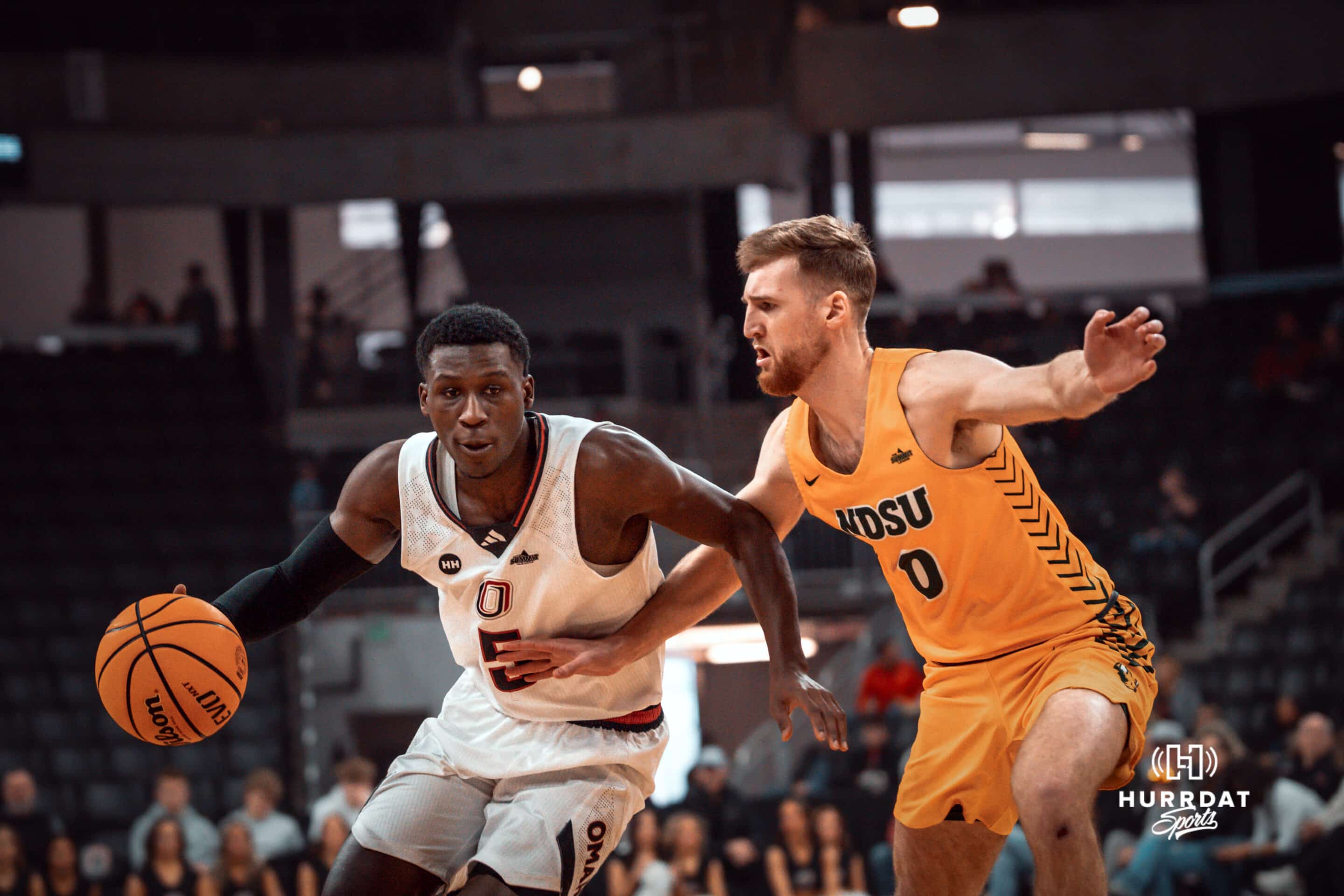 Omaha Maverick Ja'Sean Glover dribbles past a defender against the North Dakota State Bison during a college basketball game on Saturday, February 8, 2025 in Omaha, Nebraska. Photo by Logan Hock.