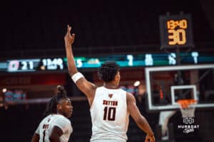 Omaha Maverick Marquel Sutton celebrates a three-pointer against the North Dakota State Bison during a college basketball game on Saturday, February 8, 2025 in Omaha, Nebraska. Photo by Logan Hock.