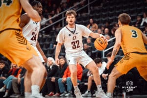 Omaha Maverick Tony Osburn looks for an opening against the North Dakota State Bison during a college basketball game on Saturday, February 8, 2025 in Omaha, Nebraska. Photo by Logan Hock.