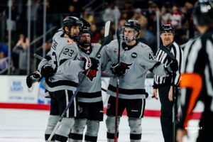 Omaha Maverick Brady Risk celebrates his goal with teammates during a hockey match at Baxter Arena on Saturday, February 2, 2025, in Omaha, Nebraska. Photo by Collin Stilen.