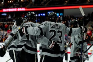 Omaha Maverick Harrison Israels celebrates his goal with his teammates during a hockey match at Baxter Arena on Saturday, February 2, 2025, in Omaha, Nebraska. Photo by Collin Stilen.