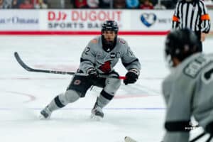 Omaha Maverick Nolan Krenzen with the passing vision during a hockey match at Baxter Arena on Saturday, February 2, 2025, in Omaha, Nebraska. Photo by Collin Stilen.
