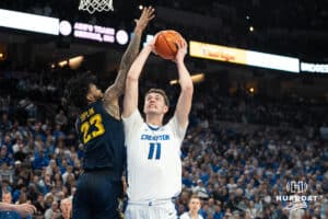 Creighton Bluejays Ryan Kalkbrenner looks to shoot during a college basketball game against Marquette on February 8th, 2025 in Omaha, Nebraska. Photo by Brandon Tiedemann.