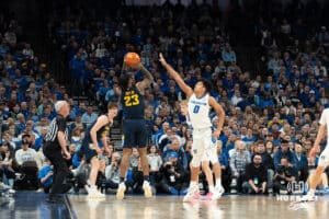 Creighton Bluejays Jasen Green contests a shot during a college basketball game against Marquette on February 8th, 2025 in Omaha, Nebraska. Photo by Brandon Tiedemann.