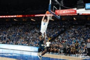 Creighton Bluejays Ryan Kalkbrenner dunks during a college basketball game against Marquette on February 8th, 2025 in Omaha, Nebraska. Photo by Brandon Tiedemann.