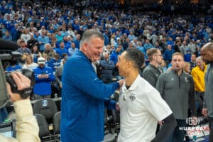 Creighton Bluejays Greg McDermott talks with Marquette head coach Shaka Smart before a college basketball game against Marquette on February 8th, 2025 in Omaha, Nebraska. Photo by Brandon Tiedemann.