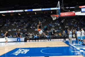 Creighton Bluejays Jamiya Neal windmill dunks pregame before a college basketball game against Marquette on February 8th, 2025 in Omaha, Nebraska. Photo by Brandon Tiedemann.