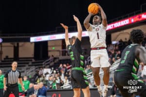 Omaha Mavericks JJ White (1) makes a three-point shot at the buzzer for the win against the North Dakota Fighting Hawks during a college basketball game on Thursday, February 6, 2025, in Omaha, Nebraska. Photo By Sam Brennan.