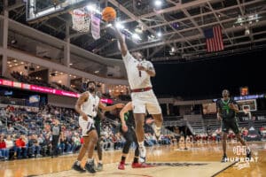 Omaha Mavericks JJ White makes a layup against the North Dakota Fighting Hawks during a college basketball game on Thursday, February 6, 2025, in Omaha, Nebraska. Photo By Sam Brennan.