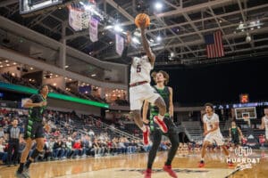 Omaha Mavericks, Ja'Sean Glover makes a layup against the North Dakota Fighting Hawks during a college basketball game on Thursday, February 6, 2025, in Omaha, Nebraska. Photo By Sam Brennan.